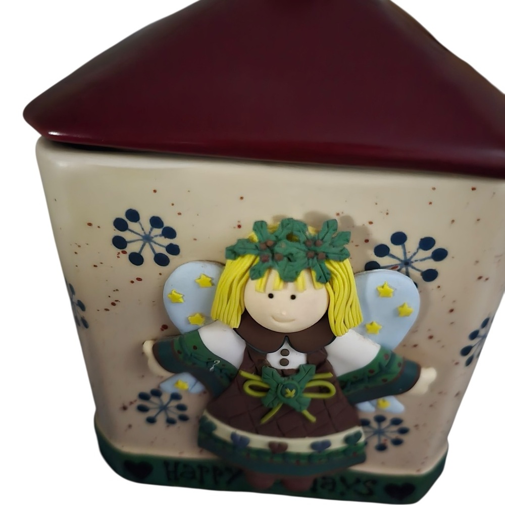 This is a Bico ceramic Happy Holidays angel cookie jar